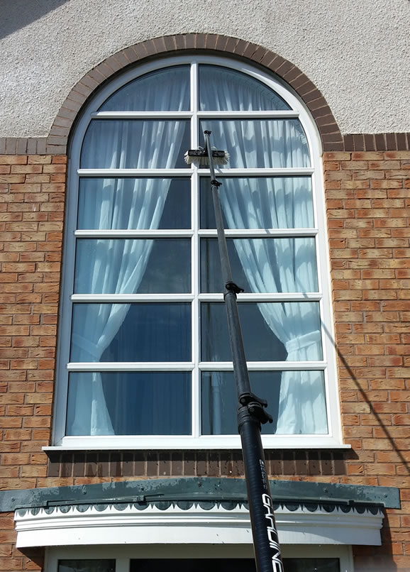 Pure water reach and wash pole system window cleaning for shops in Kettering and Corby